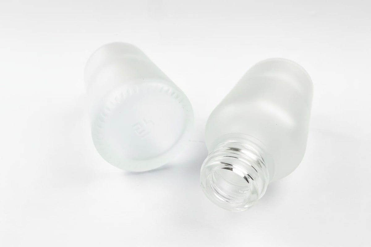 50ml Frosted Clear Glass Dropper Bottle with Stainless Steel Roller Ball with Plastic Black Cap
