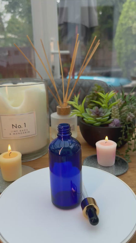100ml Blue glass dropper  bottle with Gold and black bulb dropper assembly