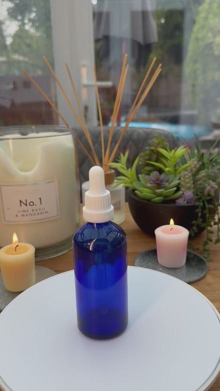 100ml Blue glass dropper bottle with white tamper evident dropper assembly