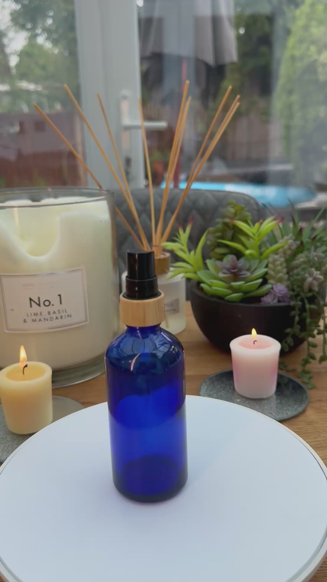 100ml Blue glass dropper bottle with Bamboo and black atomiser cap.