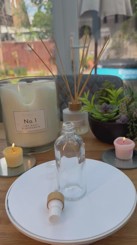 100ml Clear glass Bottle with Bamboo and white atomiser carousel