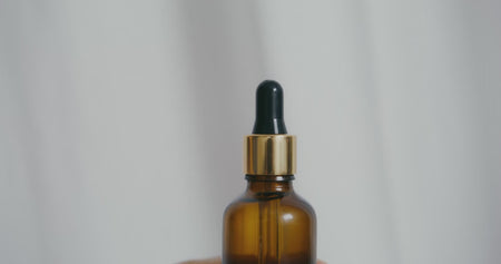 black & gold Dropper pipette dispensing single drops - added to all