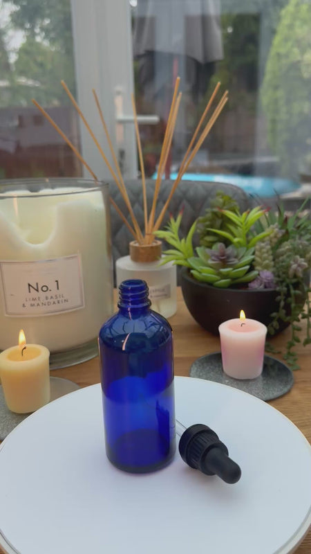 100ml Blue glass dropper bottle with black tamper evident dropper assembly